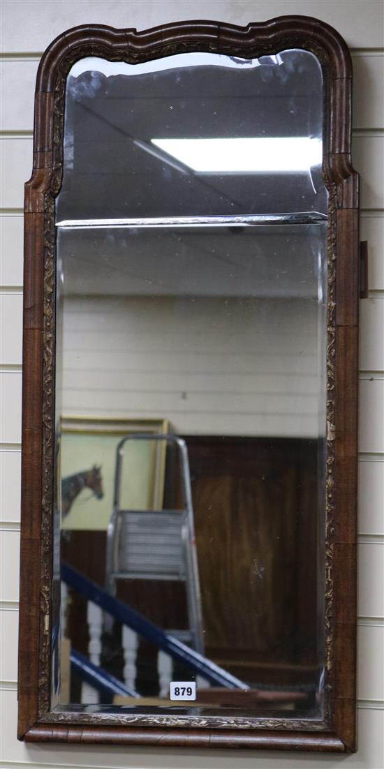 A Queen Anne walnut and parcel-gilt wall mirror W.42cm